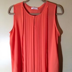 NWOT Flowy Albina pleated Orange blouse by Calvin Klein.
